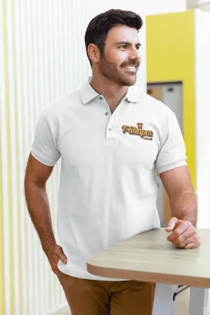 Embroidered polo shirt with company logo on chest worn by staff member